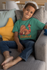 files/t-shirt-mockup-featuring-a-smiling-kid-sitting-on-a-couch-31639_8a21915f-3807-4aee-901c-a42b2b19d5ac.png