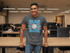 files/t-shirt-mockup-featuring-a-smiling-man-leaning-on-a-desk-at-the-office-28959_265e8ad7-b087-4a61-8470-fdbf82c14fb2.png