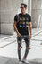 files/t-shirt-mockup-of-a-man-with-glasses-carrying-a-backpack-on-his-shoulder-421-el_bfe6434d-4720-451b-ad24-1e3cad4532ce.png