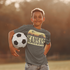 files/t-shirt-mockup-of-a-teenager-holding-a-soccer-ball-at-a-park-m16834-r-el2.png