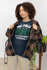 products/bella-canvas-t-shirt-mockup-featuring-a-woman-with-curly-hair-m31483.png