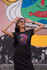 products/gildan-t-shirt-mockup-of-a-woman-with-sunglasses-posing-by-a-wall-with-urban-art-m31917.png