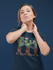 products/mockup-featuring-a-woman-wearing-a-round-neck-tshirt-while-at-a-studio-22338_49d22f91-c035-4802-8b59-20c9acabd1ab.png