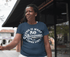 products/mockup-of-a-black-lady-with-braids-wearing-a-t-shirt-while-on-the-street-a21404.png