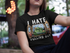 products/mockup-of-a-cropped-face-asian-girl-wearing-a-round-neck-tee-while-near-trees-a16966.png