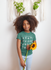 products/mockup-of-a-little-girl-wearing-a-t-shirt-holding-a-sunflower-a21318.png