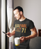 products/mockup-of-a-man-wearing-a-heathered-tee-while-having-a-coffee-at-home-42308-r-el2.png