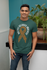 products/mockup-of-a-man-with-a-t-shirt-posing-next-to-a-plant-28956_077b5d39-34ac-4634-a74c-820d0380e73b.png