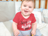 products/mockup-of-a-smiling-baby-boy-sitting-in-his-crib-while-wearing-a-onesie-a13959.png