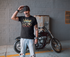 products/mockup-of-a-tshirt-being-worn-by-a-biker-using-a-bandana-in-front-of-his-motorcycle-20254_8ff89ccb-8a9a-4e67-a227-5bf5d755ff68.png