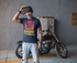 products/mockup-of-a-tshirt-being-worn-by-a-biker-using-a-bandana-in-front-of-his-motorcycle-20254_a43bbe95-0a83-4f37-8cc2-db219ddb5f06.png