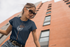 products/mockup-of-a-young-woman-wearing-a-t-shirt-in-a-city-24641_997e2ccd-634a-49e6-8b1e-b161a646e5ca.png