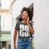 products/ringer-t-shirt-mockup-of-a-curly-hair-woman-smiling-and-talking-on-the-phone-m16872-r-el2.png