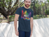 products/t-shirt-mockup-featuring-a-bearded-man-posing-at-an-urban-park-28212.png