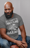 products/t-shirt-mockup-of-a-bald-bearded-man-sitting-on-a-chair-21526.png