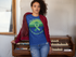 products/t-shirt-mockup-of-a-curly-haired-girl-leaning-on-an-old-piano-24286.png