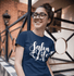products/t-shirt-mockup-of-a-curly-haired-girl-with-glasses-25802.png