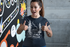 products/t-shirt-mockup-of-a-happy-customer-giving-thumbs-up-against-a-graffiti-wall-26209_7303840a-d483-47de-9a51-4df0f522f9c3.png