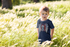 products/t-shirt-mockup-of-a-little-boy-surrounded-by-tall-grass-2912-el1.png