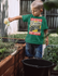 products/t-shirt-mockup-of-a-little-boy-watering-the-plants-of-a-garden-44346r-el2.png