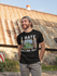 products/t-shirt-mockup-of-a-man-posing-in-front-of-an-old-structure-28199_21181890-b35d-476d-aca3-781edeedf534.png