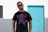products/t-shirt-mockup-of-a-man-wearing-sunglasses-in-an-urban-neighborhood-25932.png