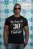 products/t-shirt-mockup-of-a-man-with-sunglasses-against-a-blue-tiling-30449.png