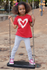 products/t-shirt-mockup-of-a-playful-girl-standing-on-a-swing-32179_91fdf007-3b1c-45f5-a19c-65dfeef166de.png