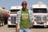 products/t-shirt-mockup-of-a-truck-driver-posing-in-front-of-two-trucks-29460_fd293790-10b2-4c6d-be00-31c95ebc9dc6.png