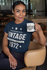 products/t-shirt-mockup-of-a-woman-sitting-on-a-chair-holding-an-11-oz-coffee-mug-31705_7c9bebb7-e02d-4850-80c7-0a29f562a94a.png