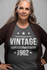 products/t-shirt-mockup-of-an-elder-woman-at-a-studio-28449.png