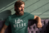 files/ringer-t-shirt-mockup-featuring-a-cool-bearded-man-sitting-on-a-purple-couch-27931_e31ccb9e-d3e5-4814-86fc-73f823dccd52.png