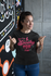files/t-shirt-mockup-featuring-a-happy-customer-standing-by-an-art-wall-26210_37894a9d-5905-4501-81fe-61f29cb32a22.png