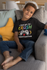 files/t-shirt-mockup-featuring-a-smiling-kid-sitting-on-a-couch-31639_0090bc54-0bb7-41f7-80d9-f7f6b56011b6.png