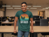 files/t-shirt-mockup-featuring-a-smiling-man-leaning-on-a-desk-at-the-office-28959_3fa34b15-db57-4240-b7db-e2dbee53ebf4.png