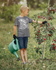 products/basic-t-shirt-mockup-of-a-kid-planting-a-small-tree-44946-r-el2.png