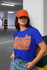 products/dad-hat-mockup-of-a-woman-wearing-a-t-shirt-in-the-parking-lot-28612.png
