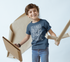 products/happy-kid-wearing-a-t-shirt-mockup-playing-with-cardboard-toys-a19484.png