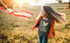 products/heather-tee-mockup-of-a-girl-playing-in-the-countryside-39282-r-el2.png