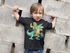 products/little-boy-wearing-a-t-shirt-mockup-while-raising-his-arms-a17943.png