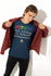 products/mockup-featuring-stickers-and-a-young-man-showing-off-his-bella-canvas-t-shirt-m15168.png