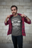 products/mockup-of-a-bearded-man-wearing-a-t-shirt-putting-on-a-plaid-shirt-over-it-20054.png