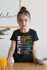 products/mockup-of-a-girl-wearing-a-t-shirt-at-breakfast-31681_25839fd9-5ca7-45d9-b629-76939688a4ec.png