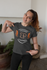 products/mockup-of-a-happy-customer-showing-off-her-t-shirt-26191_d20731aa-39e3-4c9f-8155-f4be78c18246.png