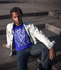 products/mockup-of-a-man-with-locs-wearing-a-tee-and-sitting-on-steps-20027.png