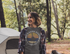 products/mockup-of-a-young-woman-at-a-campfire-wearing-a-customizable-t-shirt-30469.png