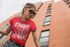 products/mockup-of-a-young-woman-wearing-a-t-shirt-in-a-city-24641.png
