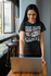 products/round-neck-gildan-t-shirt-mockup-featuring-a-woman-at-work-m31784_a0827698-7320-418b-a1b0-eb111070f38a.png