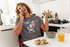 products/t-shirt-mockup-featuring-a-man-talking-on-the-phone-while-eating-breakfast-46581-r-el2.png
