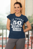 products/t-shirt-mockup-featuring-a-middle-aged-woman-standing-against-a-balcony-door-31606.png